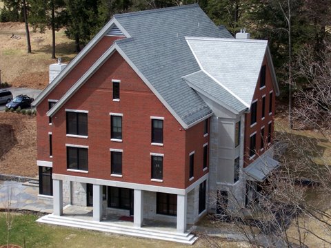 New commercial construction with slate and copper installation.
